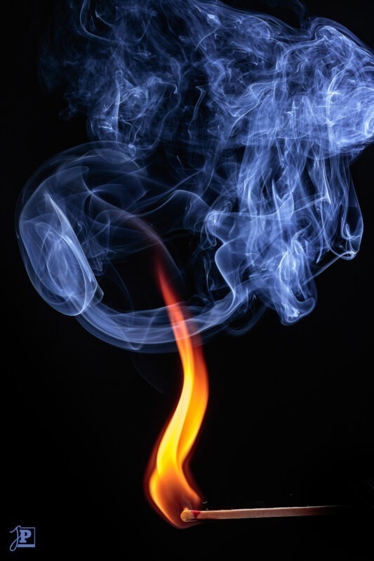 Burning matchstick